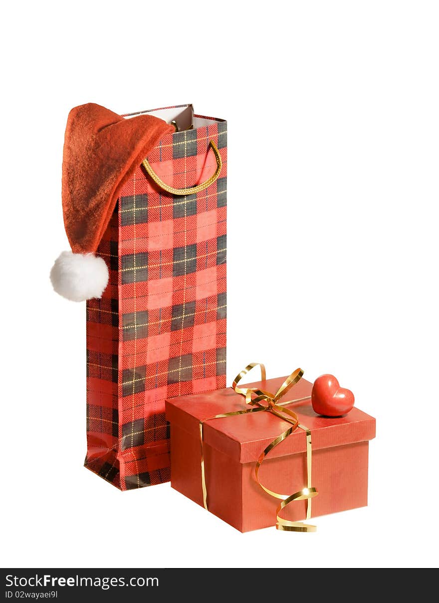 Isolated gifts with santa hat and heart