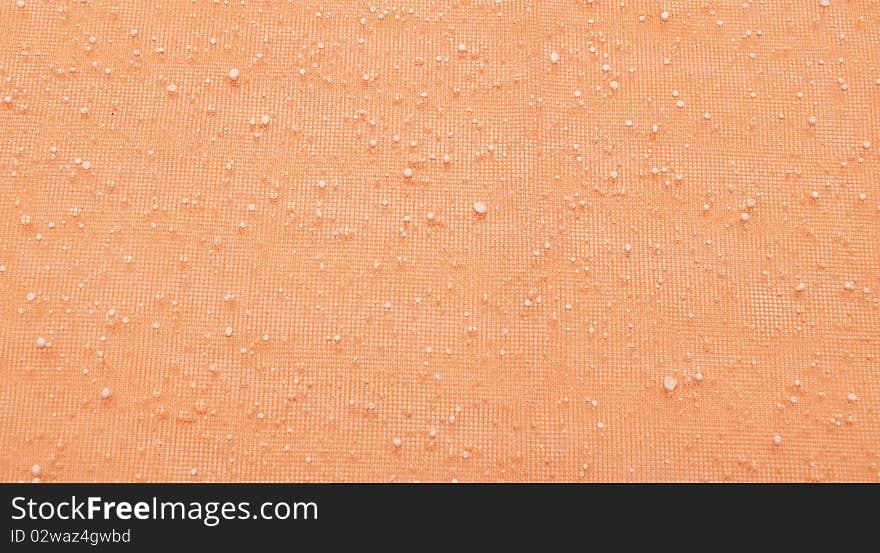 Close orange grid with white dots for background