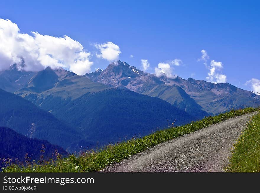 Country path in mountains, Wiesen, Swiss Alps. Country path in mountains, Wiesen, Swiss Alps