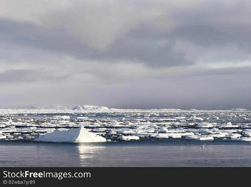 Arctic winter landscape - frozen fjord and glacier. Arctic winter landscape - frozen fjord and glacier