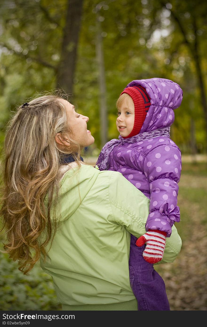 Mother and daughter in park