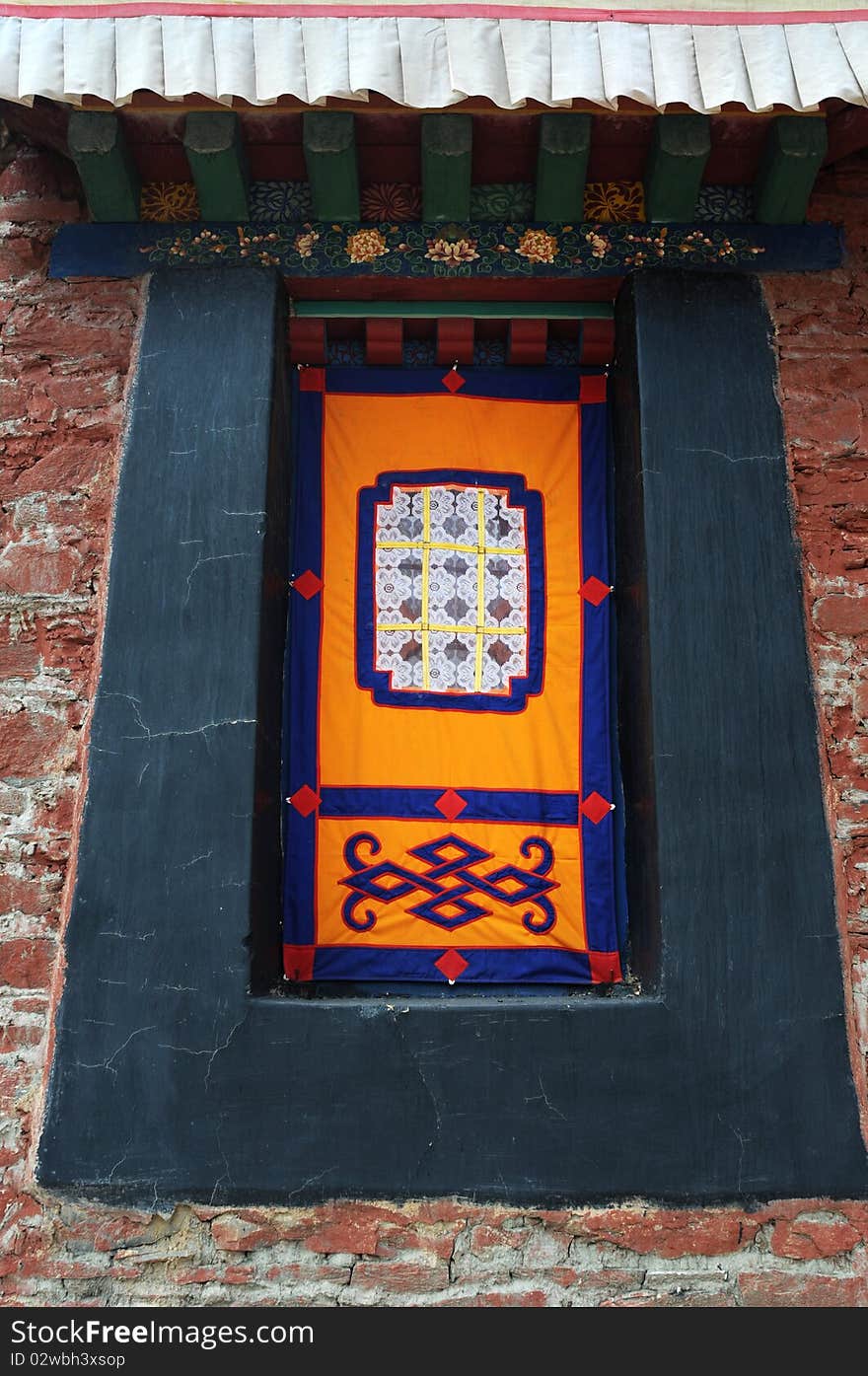 A window of typical Tibetan style in Lhasa,Tibet.Details. A window of typical Tibetan style in Lhasa,Tibet.Details.