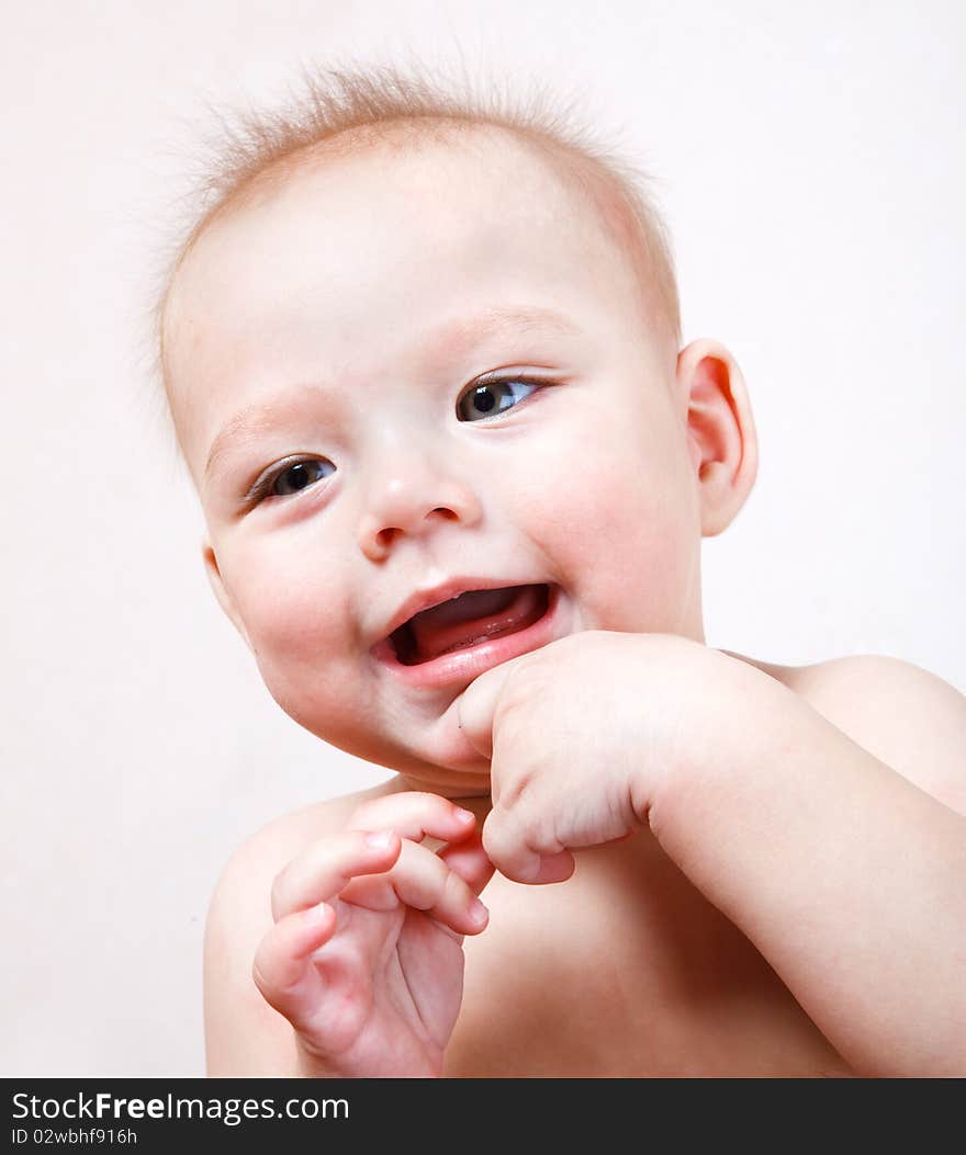 Portrait of a laughing baby boy