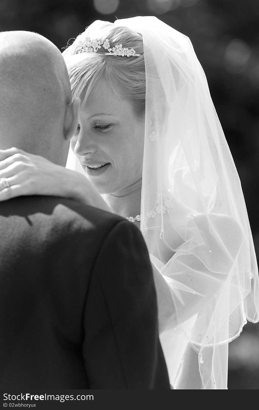 Intimate moment captured between a beautiful bride and groom