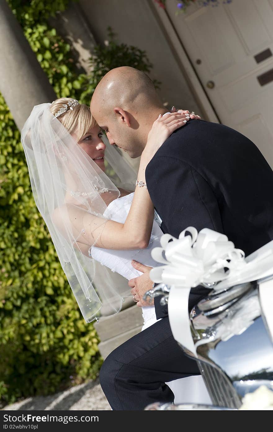 Intimate moment captured between a beautiful bride and groom