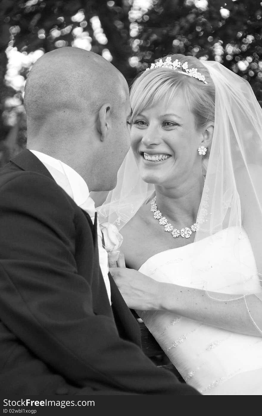 Intimate moment captured between a beautiful bride and groom