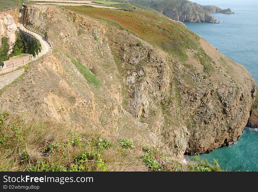 La Coupee causeway on Sark in the Channel Islands. La Coupee causeway on Sark in the Channel Islands