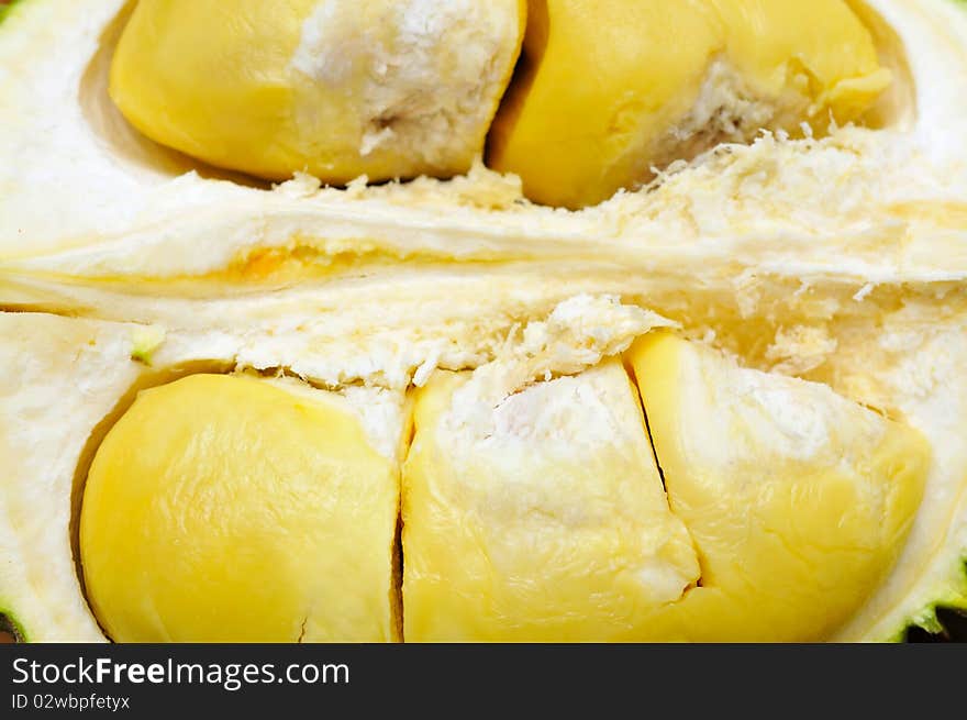 Durian cut open showing ripe fruit. For food and fruit concepts. Durian cut open showing ripe fruit. For food and fruit concepts.