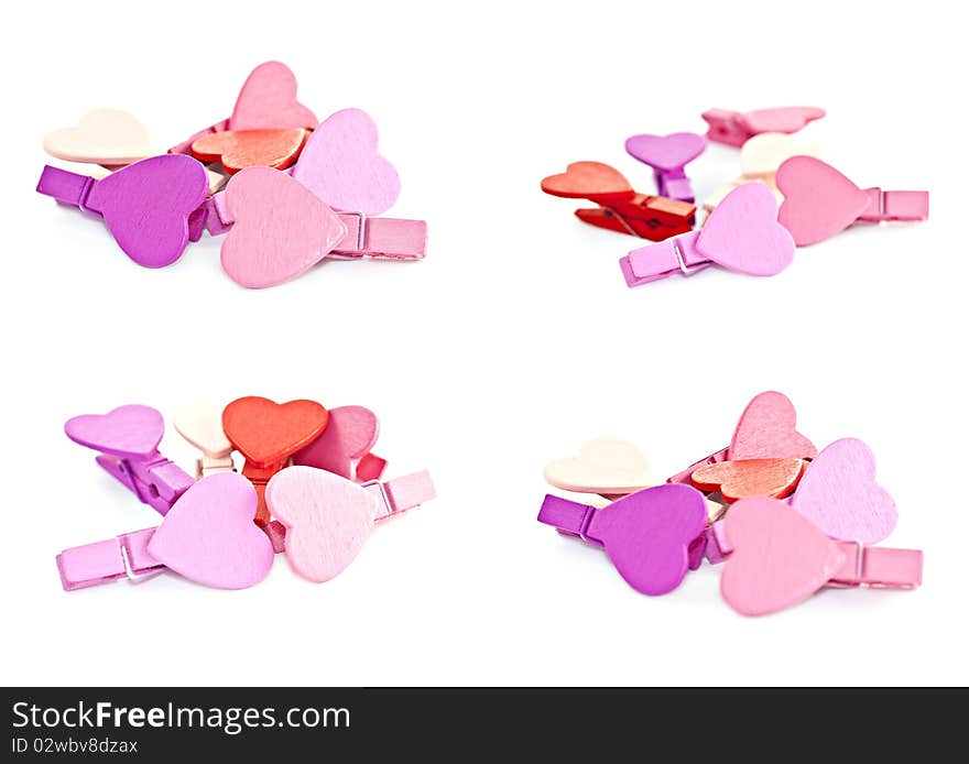 Colorful wooden pegs with a heart.