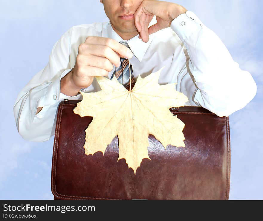 Finance crisis similar autumn dry  leaf fall upon modern business