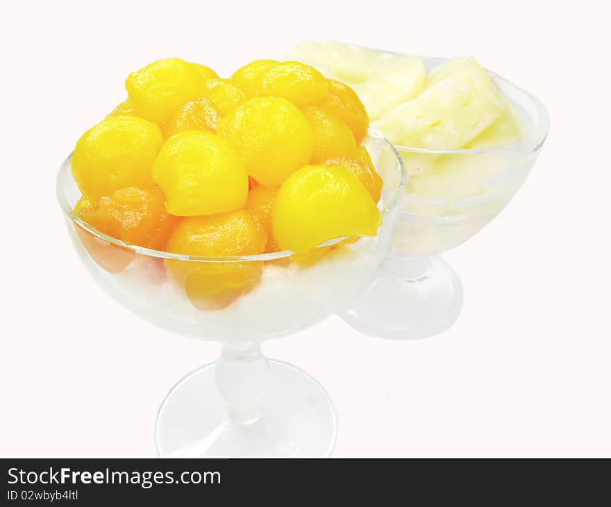 Papaya fruit in balls in syrup tropical dessert isolated. Papaya fruit in balls in syrup tropical dessert isolated