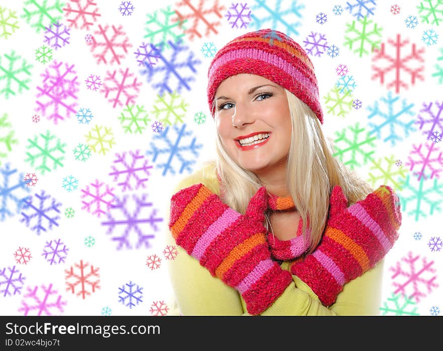 Seasonal portrait of pretty funny woman in hat and gloves smiling. white background. Seasonal portrait of pretty funny woman in hat and gloves smiling. white background