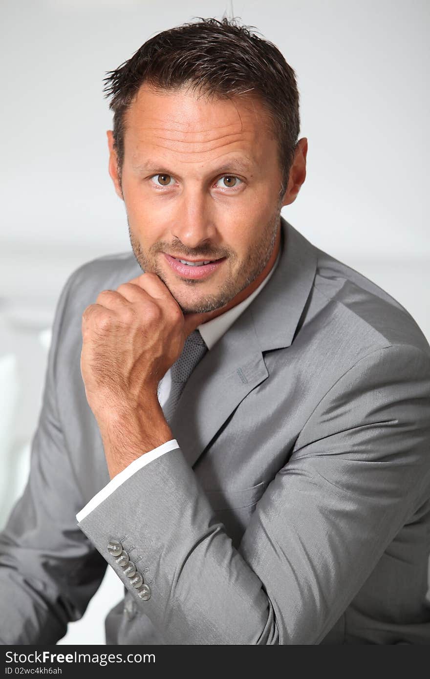 Closeup of businessman wearing grey suit. Closeup of businessman wearing grey suit