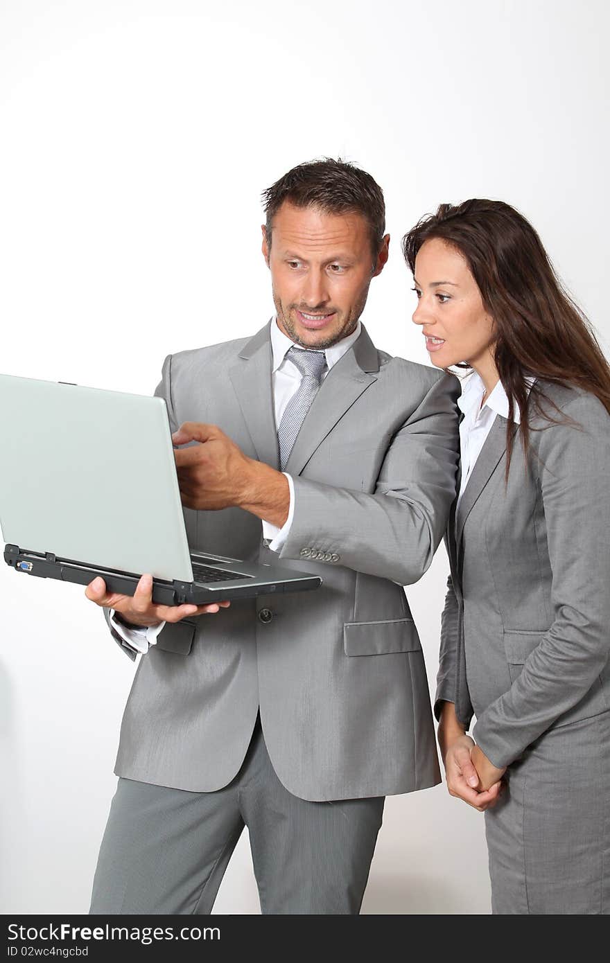 Business partners standing on white background. Business partners standing on white background