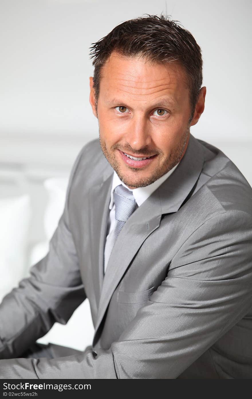 Closeup of businessman wearing grey suit. Closeup of businessman wearing grey suit