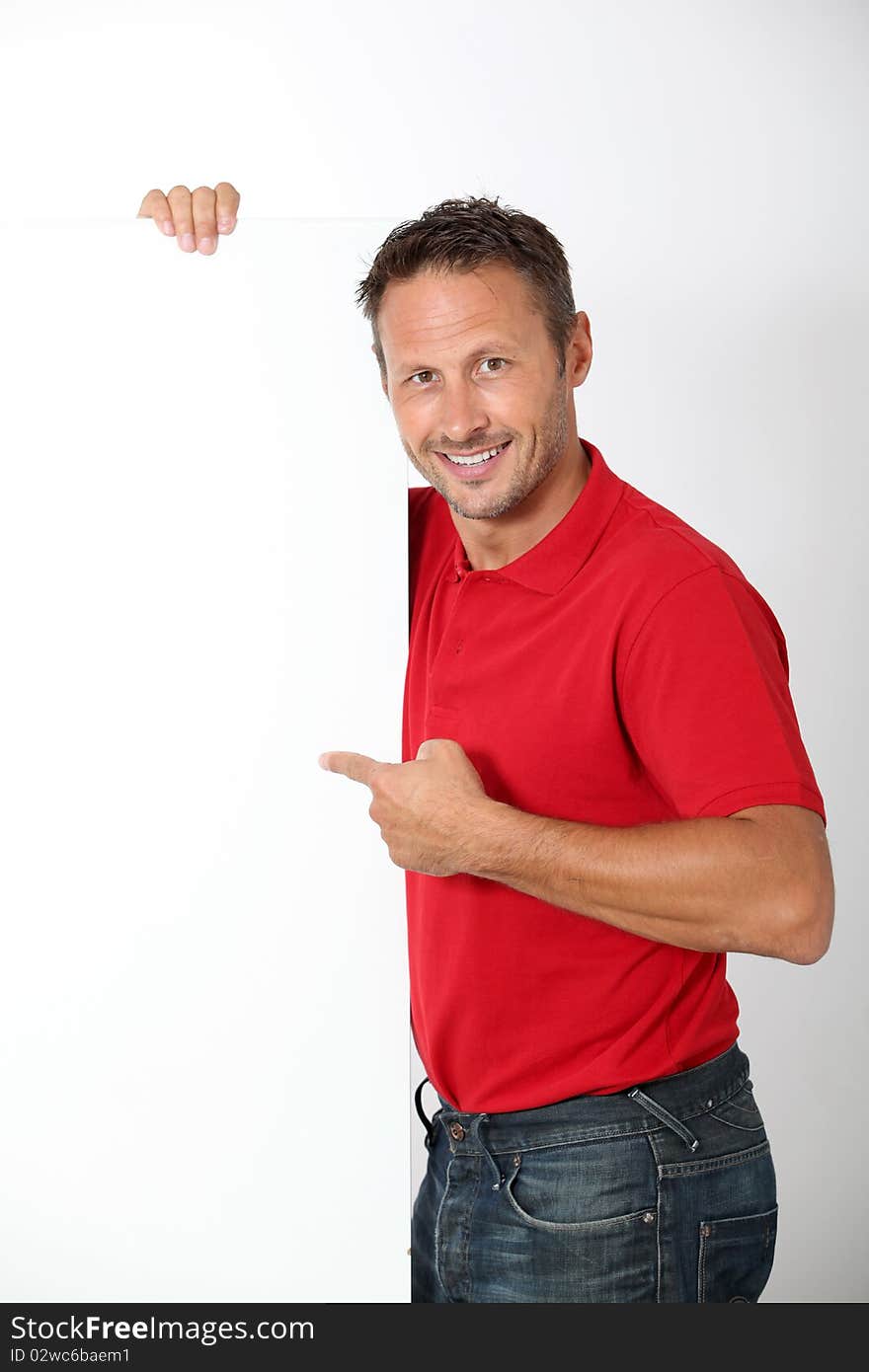 Smiling man pointing at message