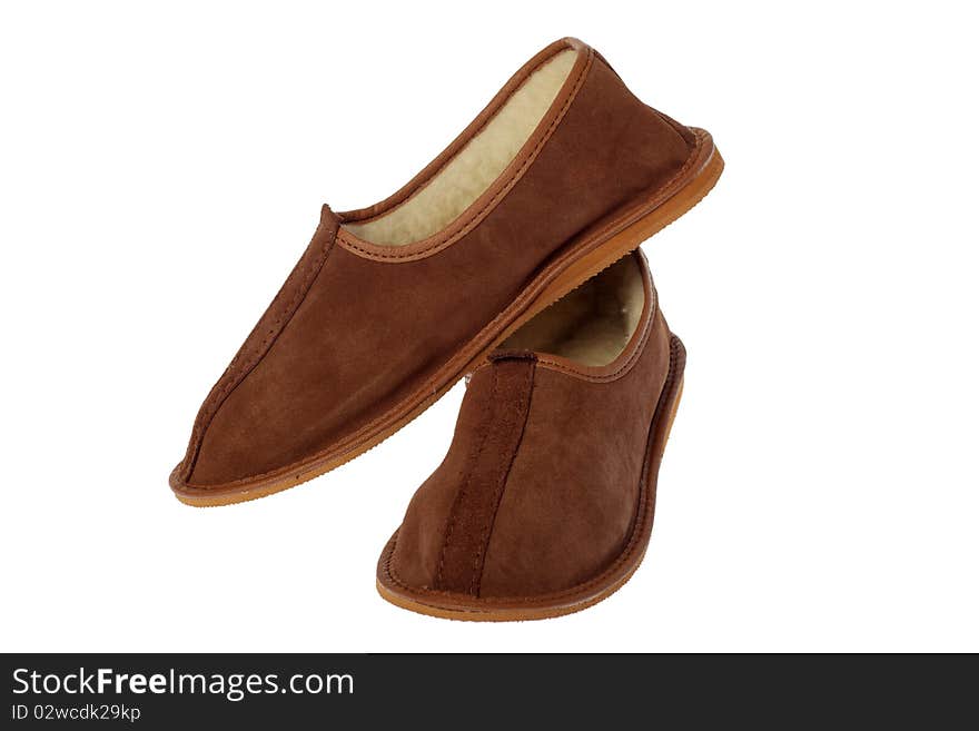 Isolated brown comfortable slippers