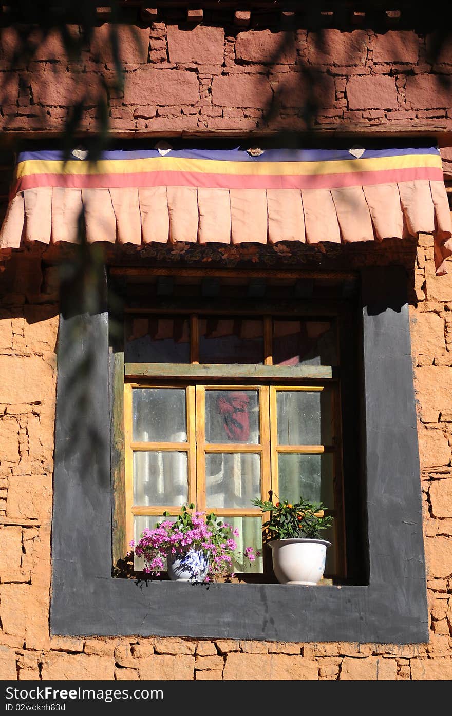 A window of typical Tibetan style in Lhasa,Tibet.Details. A window of typical Tibetan style in Lhasa,Tibet.Details.