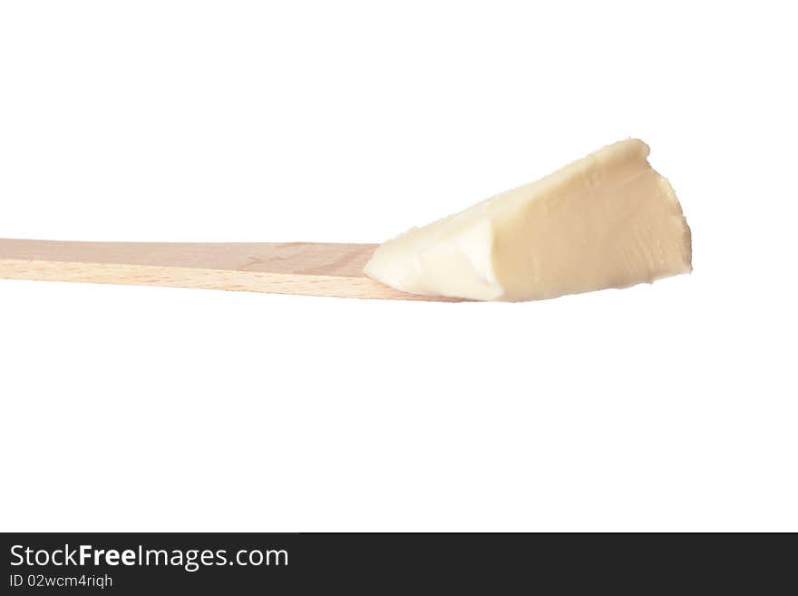 Butter on a wooden knife