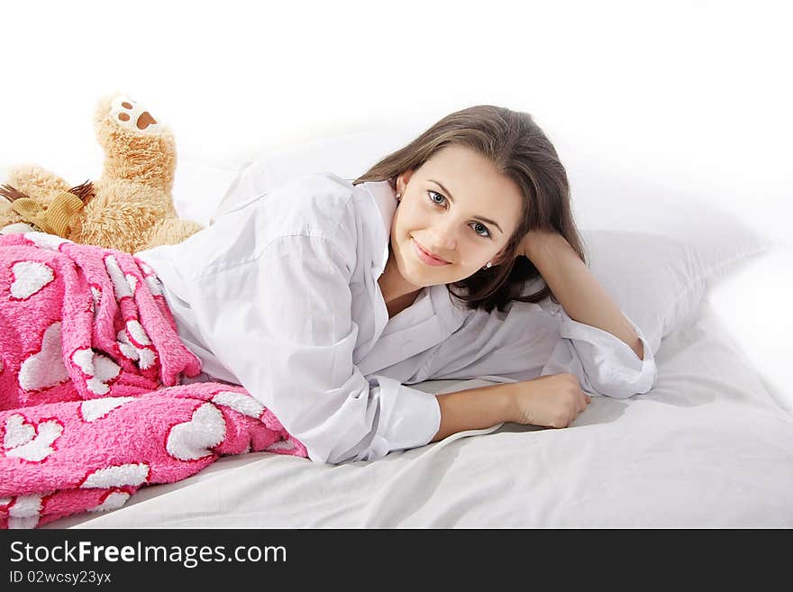 Young woman in bed