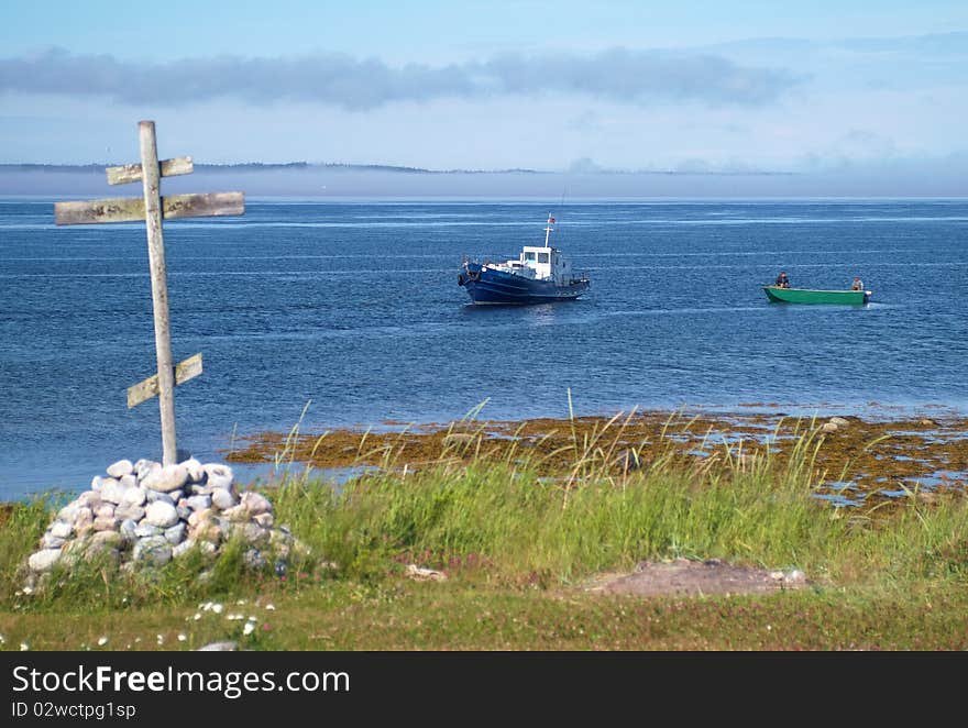 Wooden cross on coast