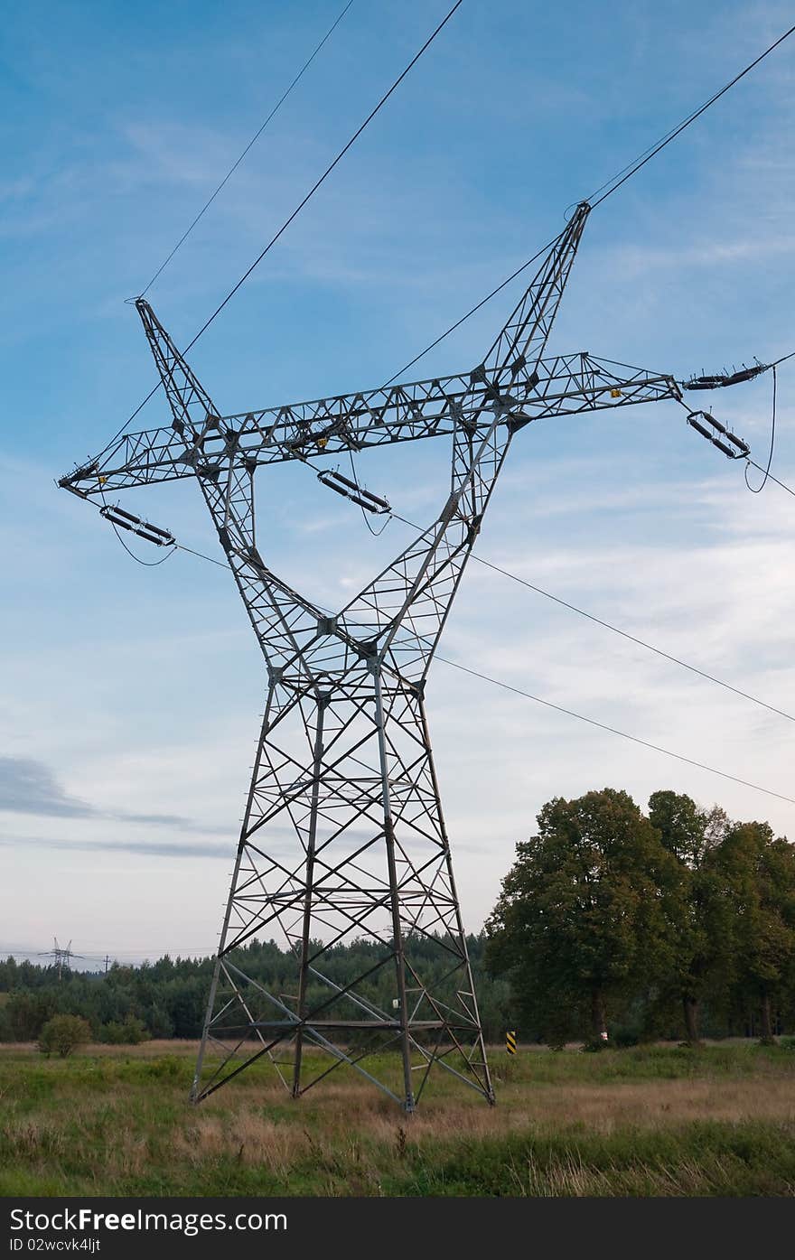 Transmission power line in sunset