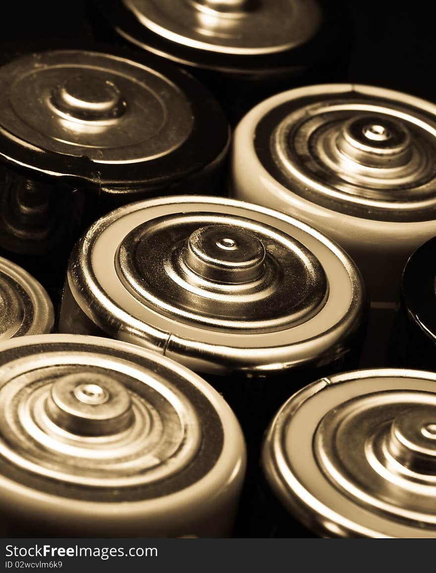 Closeup shot of batteries in sepia