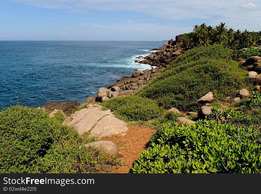 Unawatuna tropical green coast with rocks. Unawatuna tropical green coast with rocks