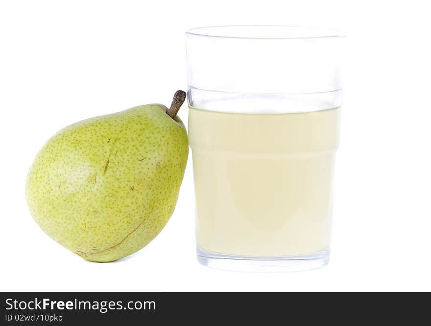 Pear with tumbler of fruit juice white background with room for copy space. Pear with tumbler of fruit juice white background with room for copy space