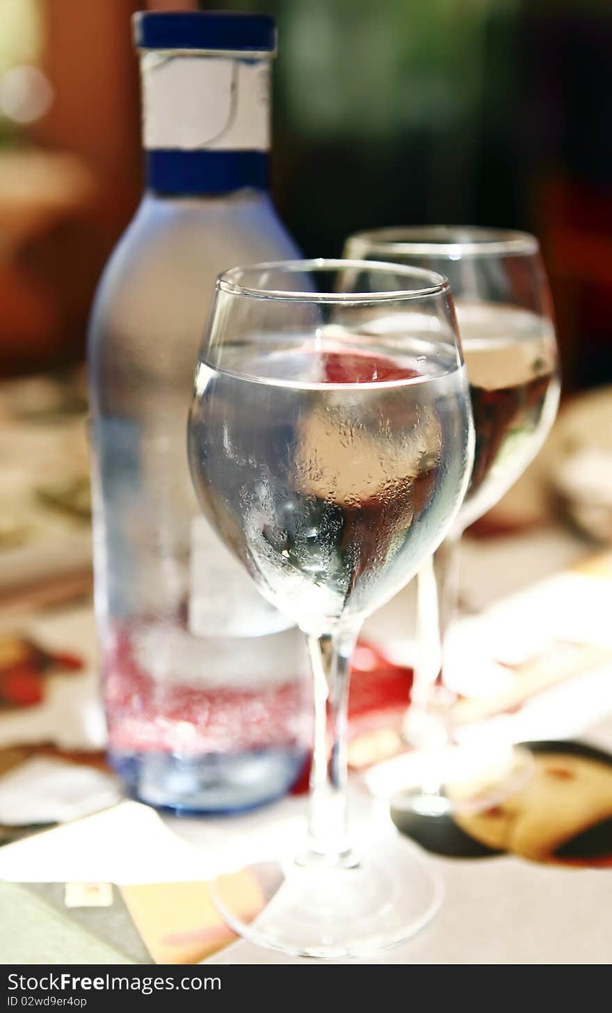 Two glasses of cold mineral water on a hot summer dayTwo glasses of cold mineral water on a hot summer day