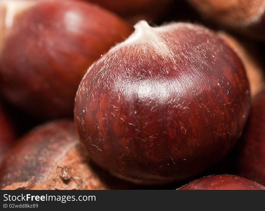 Raw chestnuts in a bowl.