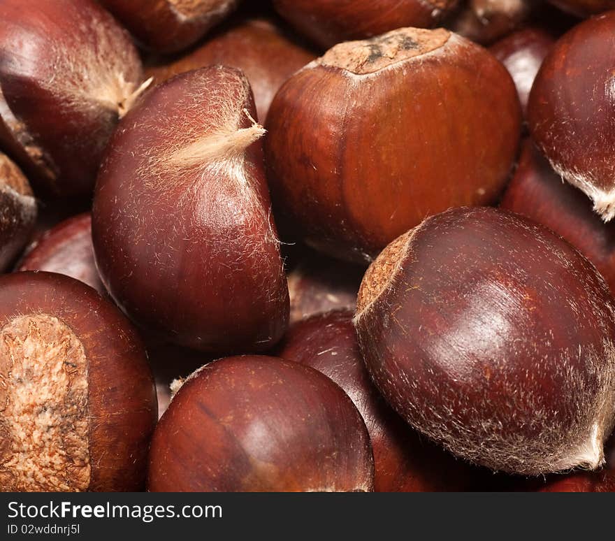 Raw chestnuts in a bowl.