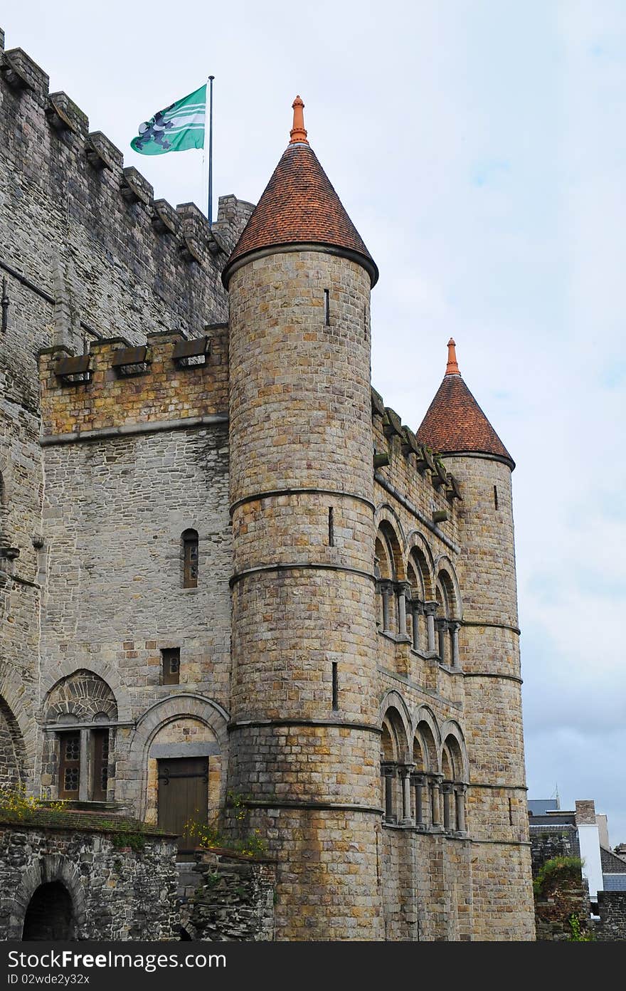 Old castle towers with flag