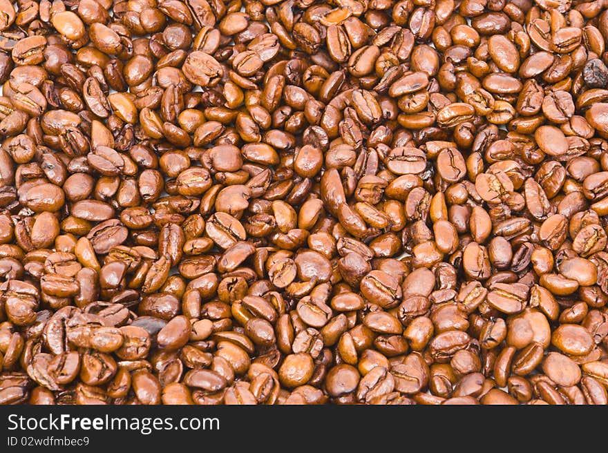 Background of gourmet freshly roasted coffee beans. Background of gourmet freshly roasted coffee beans