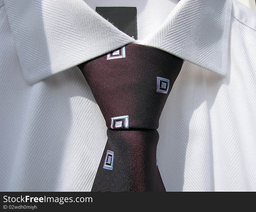 Close up White shirt and purple tie node