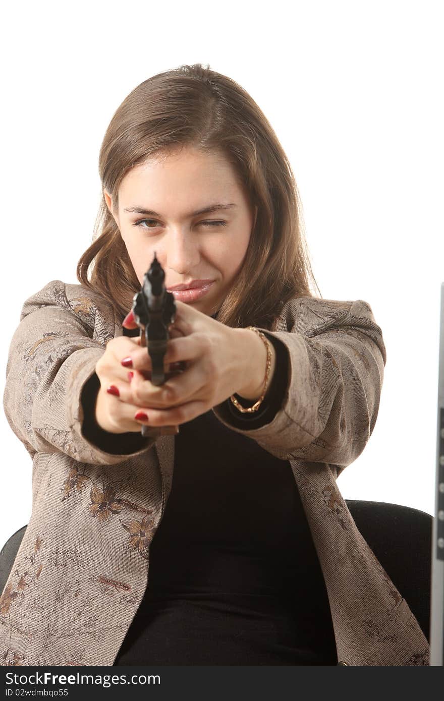 Businesswomen is aiming a revolver