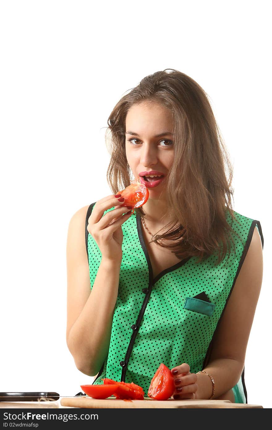 Girl eat tomato