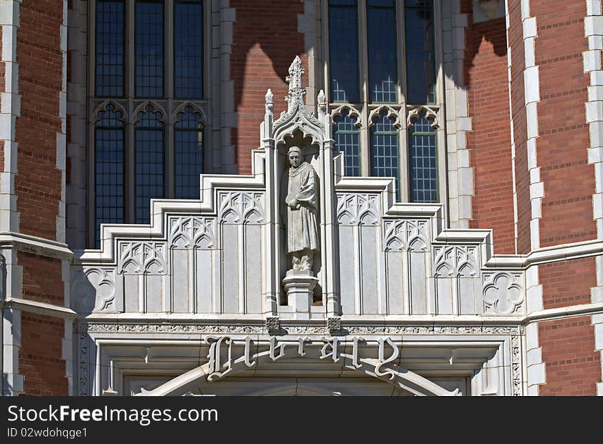 Stone and masonry Gothic details over library entrance. Stone and masonry Gothic details over library entrance.