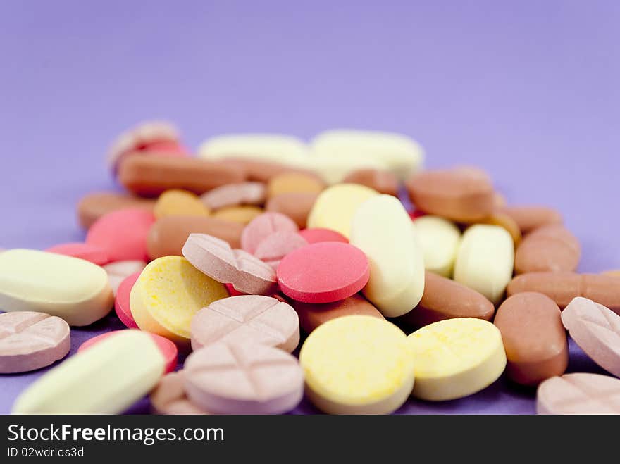 Many drug pills foreground macro photography