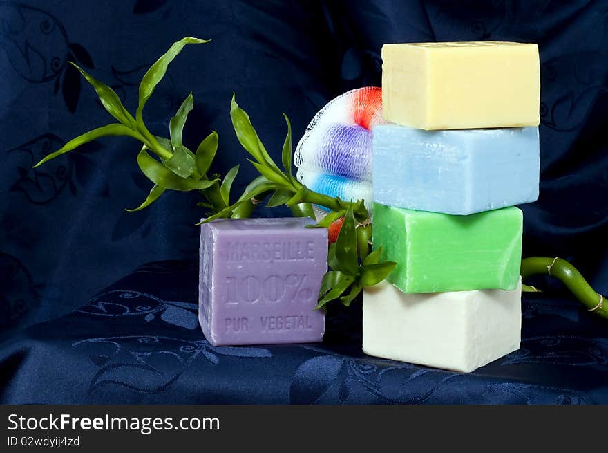 Composition with natural soap on a blue background. Composition with natural soap on a blue background