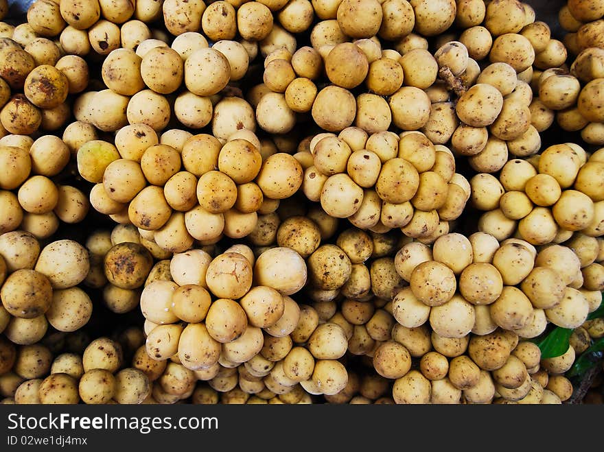 Many longan in fresh market background picture