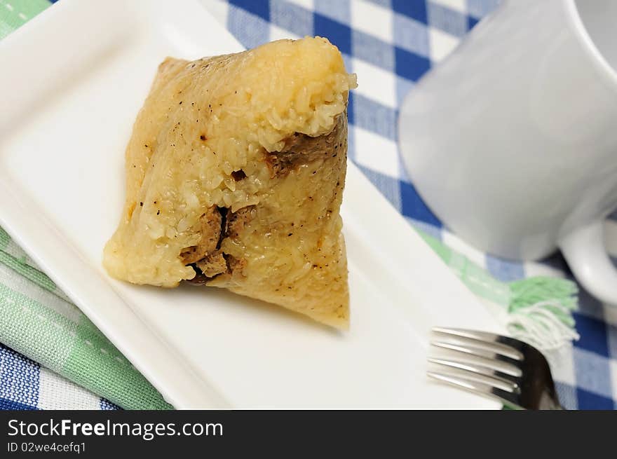 Delicious Chinese traditional meat dumpling on plate for a snack or meal. Delicious Chinese traditional meat dumpling on plate for a snack or meal.