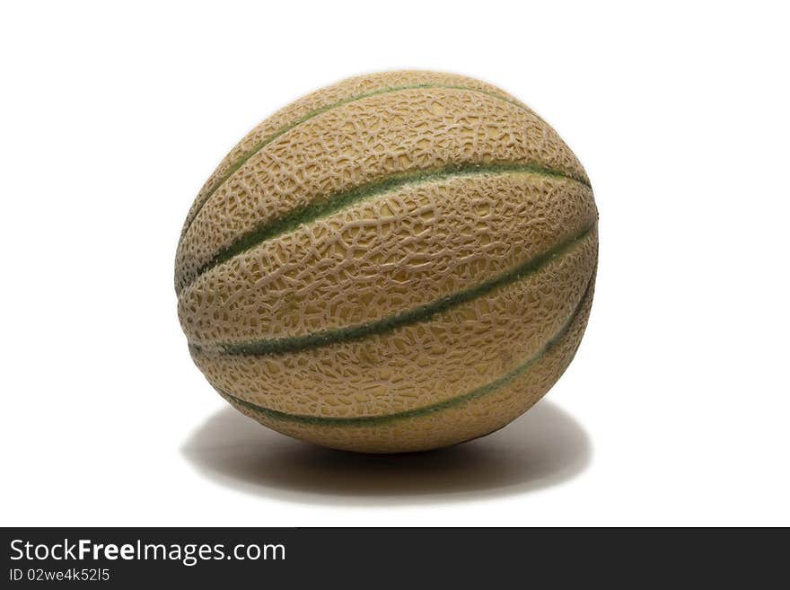 A cantelope set against a white background. A cantelope set against a white background