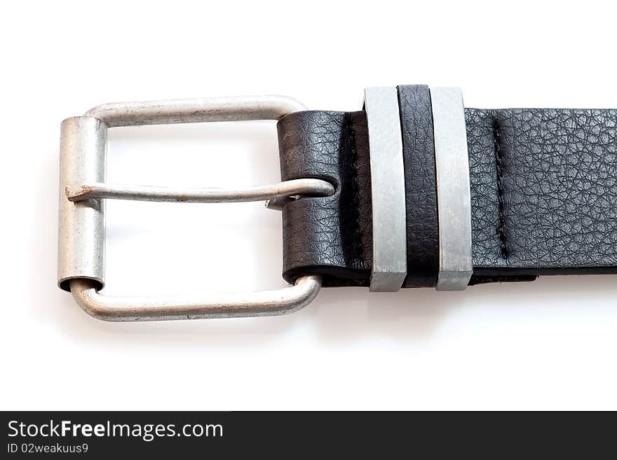 Black leather belt on a white background with shadow