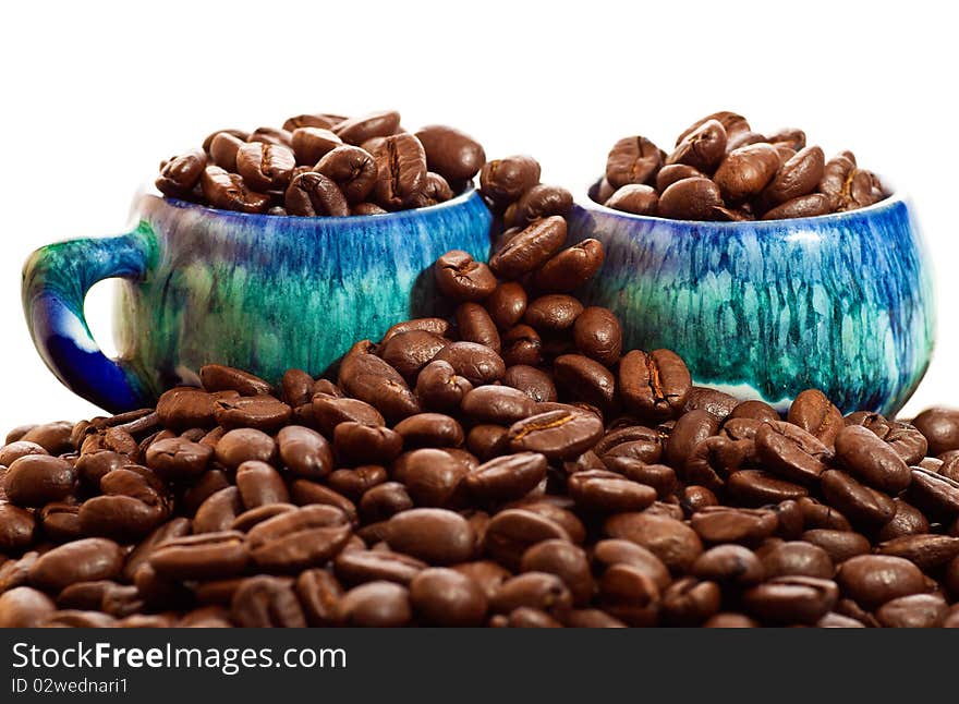 Coffee Beans And Cups On A White Background