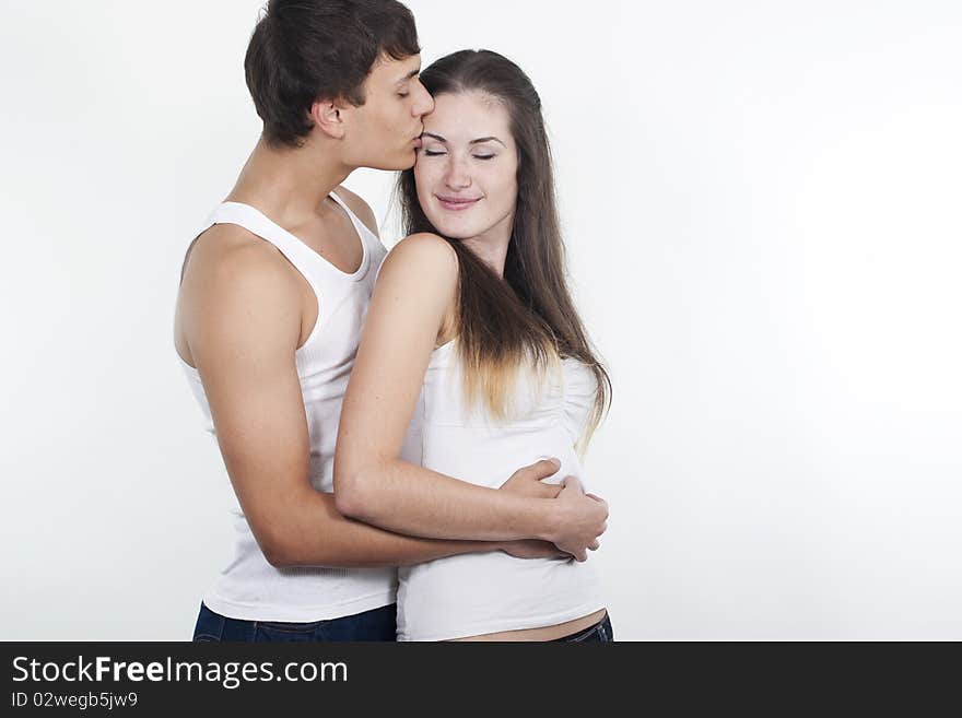 Portrait of a beautiful young happy smiling couple. Portrait of a beautiful young happy smiling couple