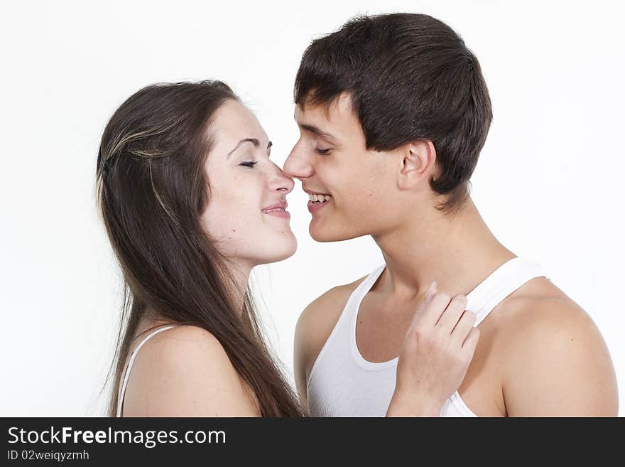 Beautiful young kissing couple