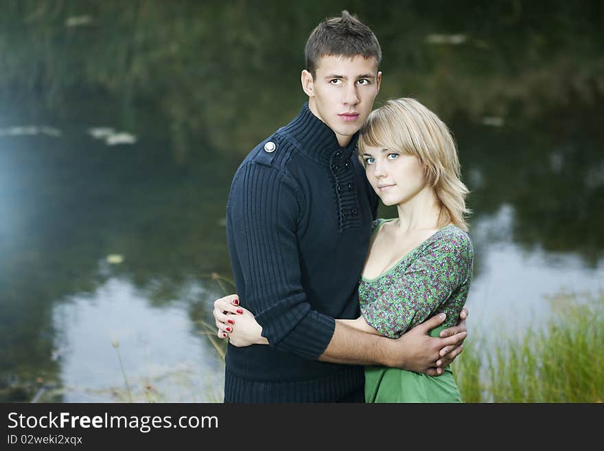 Happy couple on the lake