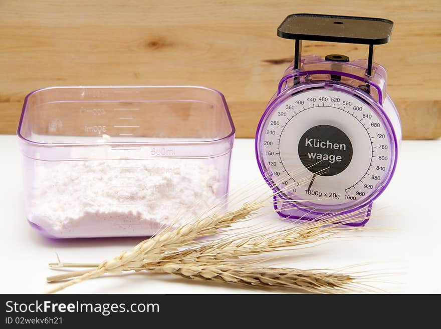 Kitchen scales with wheat flour