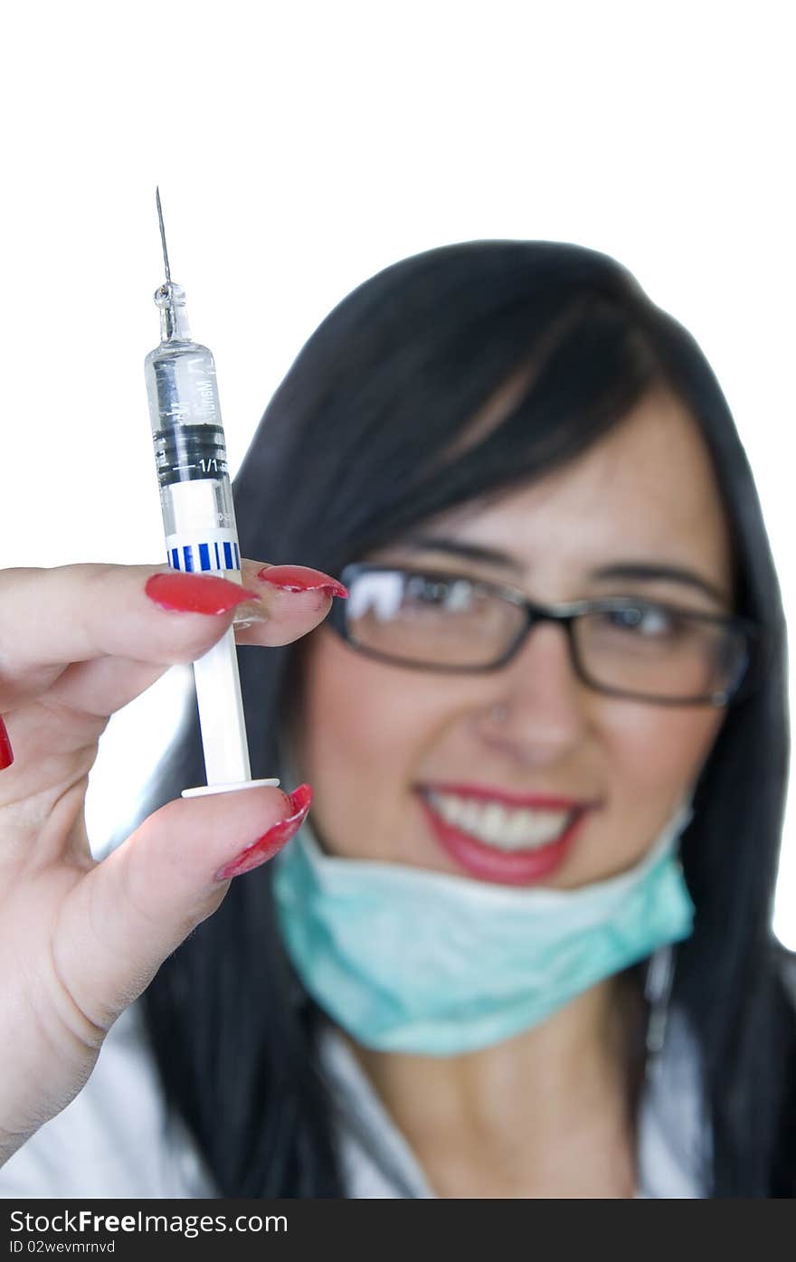 Cute young nurse preparing a vaccine. Cute young nurse preparing a vaccine